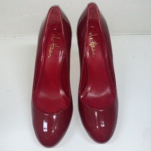 Patent leather 4 in heel, round toe, Nike Air technology. Rare find for a size 5